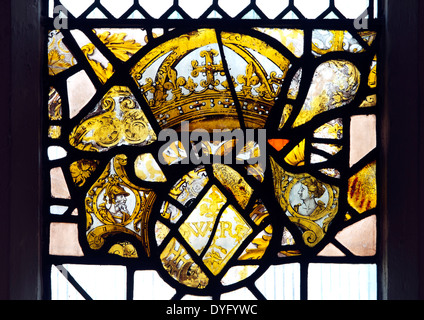 Heraldic fragments stained glass, St. Martin`s Church, Fenny Stratford, Buckinghamshire, England, UK Stock Photo